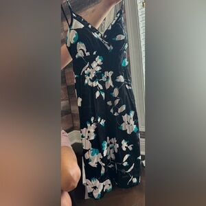 Black dress with white and turquoise flower print